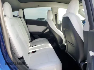 2022 Tesla Model Y Long Range z VIN 7SAYGDEE2NF433907, wystawiony jako Copart lot #54402215 z przebiegiem 44 765 mil mil oraz Szkody całkowita. Historia ofert i sprzedaży dostępna na DreamBid. Obrazek 11.