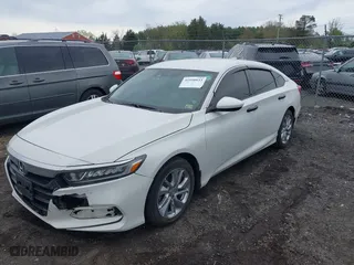 2019 Honda Accord Sedan LX 1.5T with VIN 1HGCV1F14KA169683, listed as a IAAI auction lot 41950933 with 77,628 mi miles. Bid and sale history available at carsss.com. Image 17.