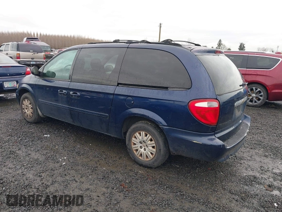 2006 Chrysler Town & Country LX with VIN 2A4GP44R46R800898, listed as a IAAI auction lot 41465720 with 215,423 mi miles and . Bid and sale history available at DreamBid. Image 3.