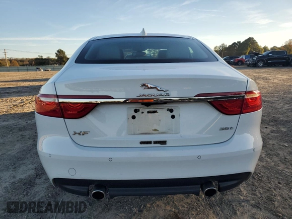2016 Jaguar XF 35t Prestige with VIN SAJBE4BV6GCY07059, listed as a Copart auction lot 80450974 with 65,981 mi miles and Salvage Title. Bid and sale history available at carsss.com. Image 6.