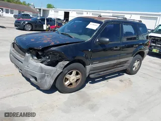 2001 Ford Escape XLT with VIN 1FMYU031X1KF31462, listed as a IAAI auction lot 41784891 with 372,527 mi miles. Bid and sale history available at carsss.com. Image 17.
