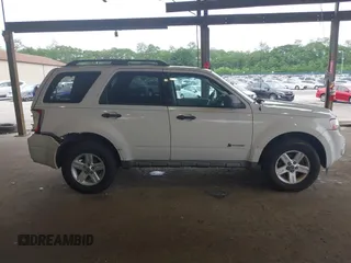 2009 Ford Escape Hybrid with VIN 1FMCU59399KC34999, listed as a IAAI auction lot 42515815 with 201,130 mi miles and . Bid and sale history available at DreamBid. Image 13.