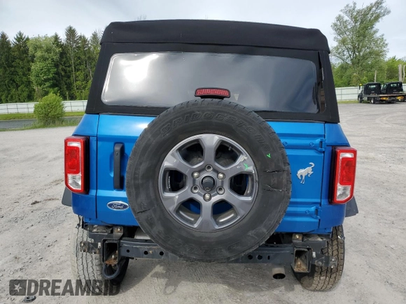 2023 Ford Bronco z VIN 1FMDE5BH7PLB11989, wystawiony jako Copart lot #58302125 z przebiegiem 25 526 mil mil oraz Szkoda całkowita • Salvage title. Historia ofert i sprzedaży dostępna na DreamBid. Obrazek 6.