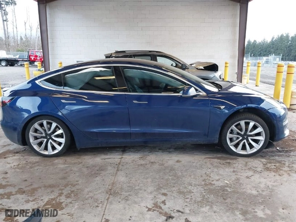 2018 Tesla Model 3 Long Range Battery with VIN 5YJ3E1EA7JF035949, listed as a IAAI auction lot 41627027 with 1 mi miles. Bid and sale history available at carsss.com. Image 13.