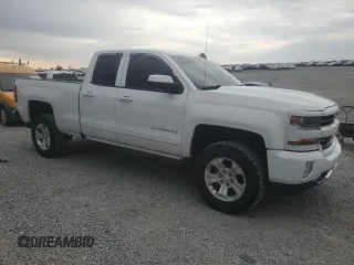 2018 Chevrolet Silverado 1500 LT with VIN 1GCVKREC7JZ176712, listed as a Copart auction lot 52084215 with 154,521 mi miles and Salvage Title. Bid and sale history available at DreamBid. Image 4.