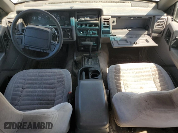 1993 Jeep Grand Cherokee Laredo с VIN 1J4GZ58S2PC654248, выставлен на аукционе Copart как лот 61259735 с пробегом 251 360 миль миль и Списание • Salvage title. История ставок и продаж доступна на DreamBid. Изображение 8.