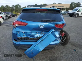 2017 Hyundai Tucson SE with VIN KM8J33A4XHU595101, listed as a Copart auction lot 47773465 with 120,430 mi miles and Salvage Title. Bid and sale history available at DreamBid. Image 6.