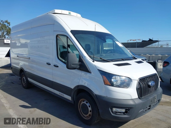 2022 Ford Transit Cargo z VIN 1FTBW3X83NKA36099, wystawiony jako IAAI lot #41966836 z przebiegiem 116 881 mil mil oraz . Historia ofert i sprzedaży dostępna na DreamBid. Obrazek 1.