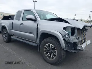 2020 Toyota Tacoma SR with VIN 3TYRZ5CN9LT000618, listed as a IAAI auction lot 42119063 with 29,503 mi miles and . Bid and sale history available at DreamBid. Image 1.