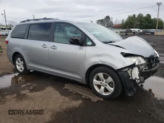 2015 Toyota Sienna LE AAS with VIN 5TDKK3DC6FS660218, listed as a Copart auction lot 51654865 with 139,801 mi miles and Salvage Title. Bid and sale history available at carsss.com. Image 4.