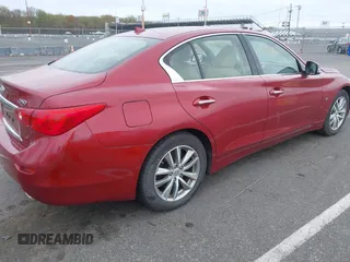 2014 Infiniti Q50 Sport with VIN JN1BV7AR1EM701939, listed as a IAAI auction lot 42051058 with 142,258 mi miles and . Bid and sale history available at DreamBid. Image 4.