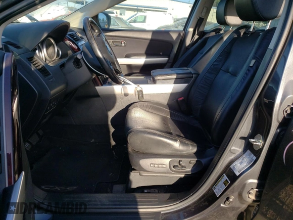 2015 Mazda CX-9 Grand Touring z VIN JM3TB3DV2F0456130, wystawiony jako Copart lot #60545095 z przebiegiem 120 892 mil mil oraz Szkoda całkowita • Salvage title. Historia ofert i sprzedaży dostępna na DreamBid. Obrazek 7.