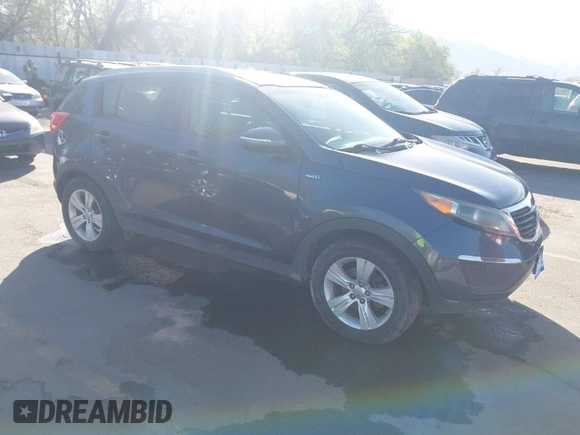 2012 Kia Sportage LX with VIN KNDPBCA28C7273676, listed as a IAAI auction lot 42034764 with 121,527 mi miles and . Bid and sale history available at DreamBid. Image 1.