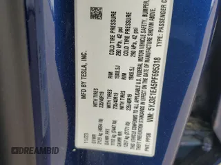 2023 Tesla Model 3 with VIN 5YJ3E1EA5PF695318, listed as a Copart auction lot 53832935 with 28,863 mi miles and Salvage title. Bid and sale history available at DreamBid. Image 12.