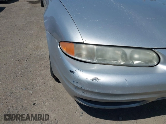 2004 Oldsmobile Alero GL1 z VIN 1G3NL52F84C227601, wystawiony jako IAAI lot #42388215 z przebiegiem 241 229 mil mil oraz . Historia ofert i sprzedaży dostępna na DreamBid. Obrazek 6.