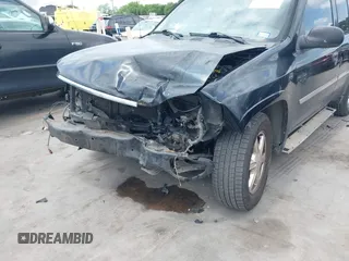 2009 GMC Envoy SLE z VIN 1GKDS33S592105035, wystawiony jako IAAI lot #42089058 z przebiegiem 249 127 mil mil oraz . Historia ofert i sprzedaży dostępna na DreamBid. Obrazek 6.