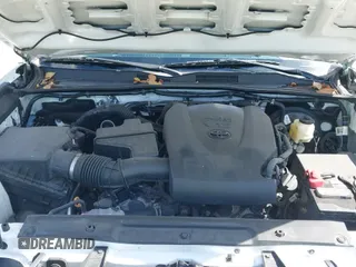 2020 Toyota Tacoma SR5 z VIN 3TMCZ5AN1LM360874, wystawiony jako IAAI lot #42525330 z przebiegiem 49 266 mil mil oraz . Historia ofert i sprzedaży dostępna na DreamBid. Obrazek 20.