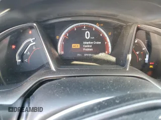 2020 Honda Civic Si z VIN 2HGFC3A51LH752322, wystawiony jako Copart lot #52797615 z przebiegiem 75 126 mil mil oraz Szkody całkowita. Historia ofert i sprzedaży dostępna na DreamBid. Obrazek 9.
