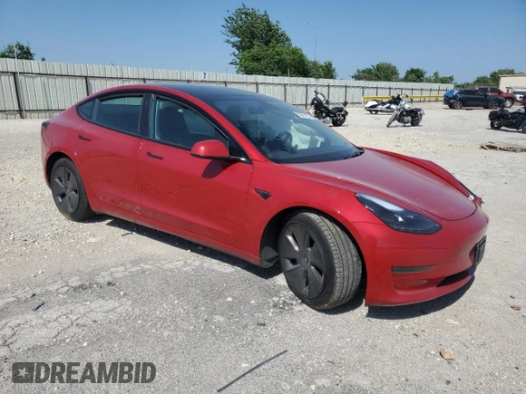2023 Tesla Model 3 with VIN 5YJ3E1EA3PF698265, listed as a Copart auction lot 53067455 with 12,192 mi miles and Salvage title. Bid and sale history available at DreamBid. Image 4.