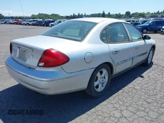2000 Ford Taurus SES with VIN 1FAFP55U8YG234331, listed as a IAAI auction lot 42797654 with 103,742 mi miles and . Bid and sale history available at DreamBid. Image 4.