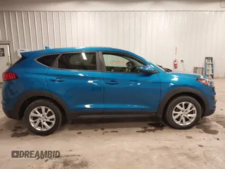 2019 Hyundai Tucson SE with VIN KM8J2CA48KU027746, listed as a IAAI auction lot 41986052 with 93,261 mi miles. Bid and sale history available at carsss.com. Image 14.