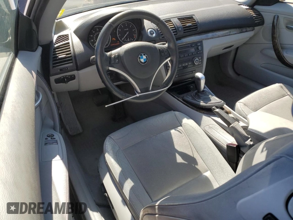 2009 BMW 1 Series 128i with VIN WBAUP93519VF48985, listed as a Copart auction lot 50715925 with 105,590 mi miles and Salvage title. Bid and sale history available at DreamBid. Image 8.