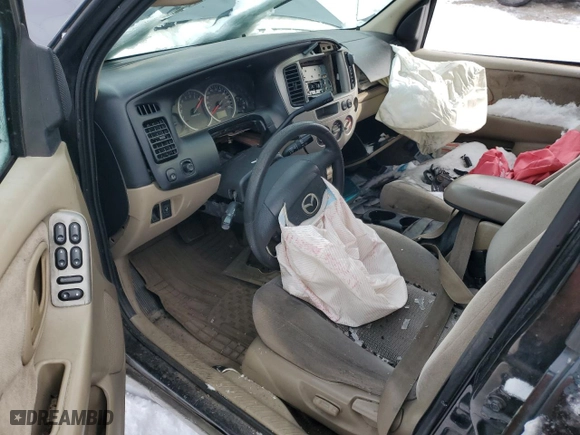 2003 Mazda Tribute LX with VIN 4F2CZ94143KM32108, listed as a Copart auction lot 87701275 with 0 mi miles and Salvage Title. Bid and sale history available at carsss.com. Image 8.