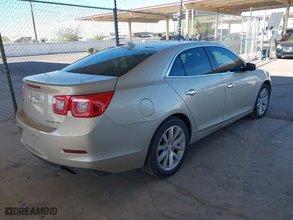 2014 Chevrolet Malibu LTZ with VIN 1G11H5SL5EF233581, listed as a IAAI auction lot 41454669 with 117,577 mi miles. Bid and sale history available at carsss.com. Image 4.