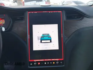 2020 Tesla Model X Long Range with VIN 5YJXCDE28LF298553, listed as a IAAI auction lot 40863184 with 54,031 mi miles and . Bid and sale history available at DreamBid. Image 18.