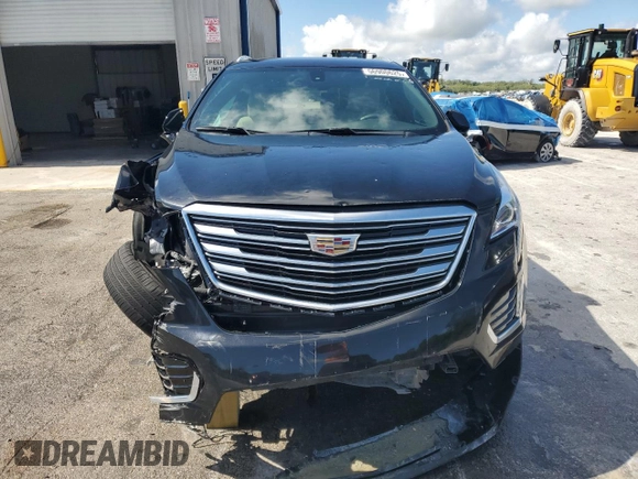 2019 Cadillac XT5 FWD with VIN 1GYKNARS9KZ219259, listed as a Copart auction lot 56900625 with 58,739 mi miles and Non repairable. Bid and sale history available at DreamBid. Image 5.