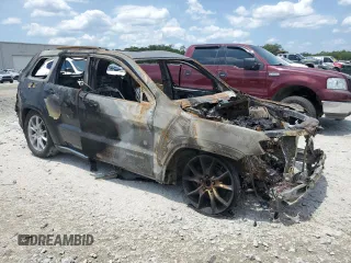 2015 Jeep Grand Cherokee Summit z VIN 1C4RJFJGXFC815431, wystawiony jako Copart lot #62073025 z przebiegiem Nie podano mil oraz Nie do naprawy • Non repairable. Historia ofert i sprzedaży dostępna na DreamBid. Obrazek 4.