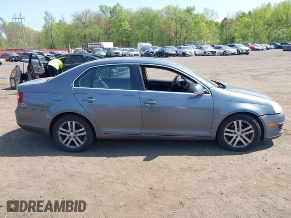 2010 Volkswagen Jetta SE with VIN 3VWRZ7AJXAM007966, listed as a IAAI auction lot 42168604 with 199,632 mi miles and . Bid and sale history available at DreamBid. Image 12.