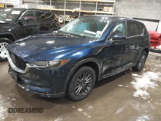 2020 Mazda CX-5 Touring z VIN JM3KFBCM9L0843045, wystawiony jako IAAI lot #41361008 z przebiegiem 76 107 mil mil oraz . Historia ofert i sprzedaży dostępna na DreamBid. Obrazek 17.