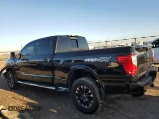 2019 Nissan Titan XD SL with VIN 1N6BA1F43KN529676, listed as a Copart auction lot 79935214 with 135,734 mi miles and Salvage Title. Bid and sale history available at carsss.com. Image 2.