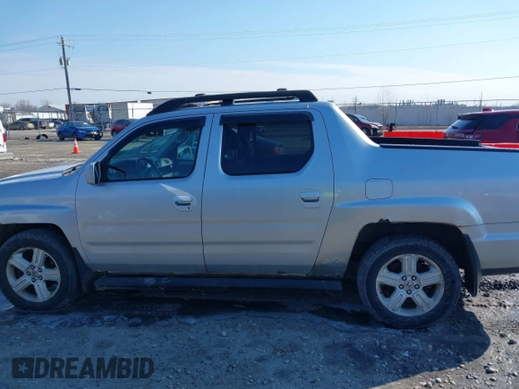2009 Honda Ridgeline RTL with VIN 2HJYK16569H002832, listed as a IAAI auction lot 41683669 with 154,220 mi miles and . Bid and sale history available at DreamBid. Image 14.