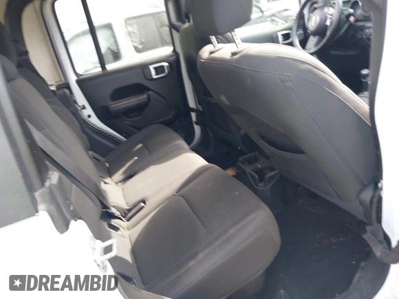 2020 Jeep Gladiator Sport S with VIN 1C6HJTAG9LL161535, listed as a IAAI auction lot 42053904 with 104,260 mi miles and . Bid and sale history available at DreamBid. Image 8.