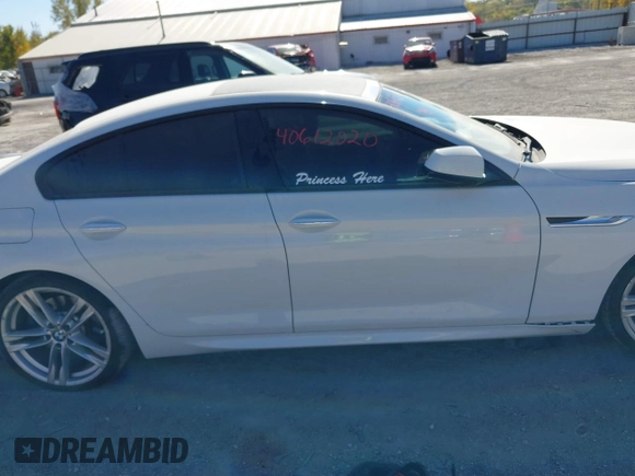 2015 BMW 6 Series 640i with VIN WBA6A0C54FGB53785, listed as a IAAI auction lot 40612020 with 67,524 mi miles and . Bid and sale history available at DreamBid. Image 13.