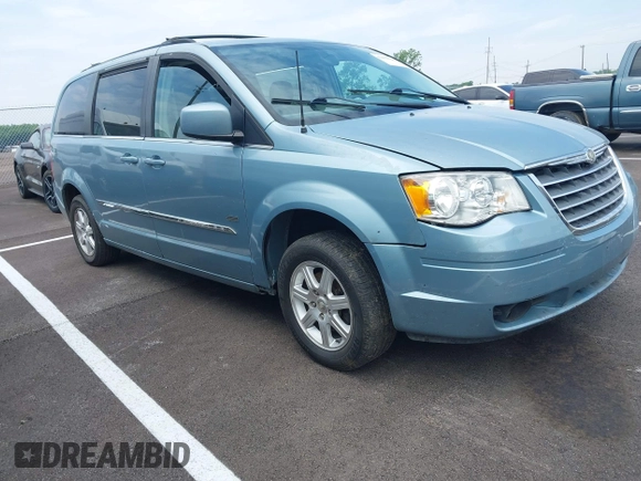 2008 Chrysler Town & Country Touring with VIN 2A8HR54P28R803822, listed as a IAAI auction lot 42459330 with 169,661 mi miles and . Bid and sale history available at DreamBid. Image 1.