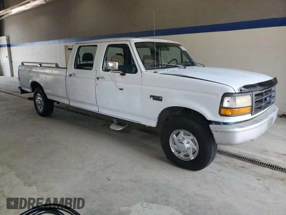 1994 Ford F-350 with VIN 1FTJW35H5REA22921, listed as a Copart auction lot 60848695 with 89,019 mi miles and Clean title. Bid and sale history available at DreamBid. Image 4.
