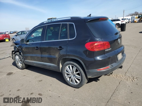 2012 Volkswagen Tiguan SE with VIN WVGAV7AX3CW605413, listed as a Copart auction lot 49847145 with 143,499 mi miles and Salvage Title. Bid and sale history available at DreamBid. Image 2.