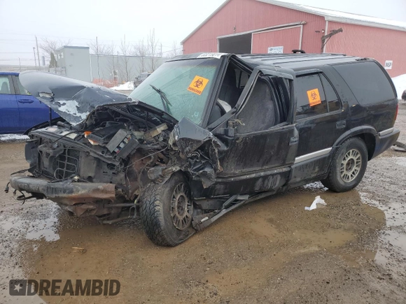 1999 GMC Jimmy SLE with VIN 1GKDT13W3X2522381, listed as a Copart auction lot 83219014 with Not Provided miles and Non Repairable. Bid and sale history available at carsss.com. Image 1.