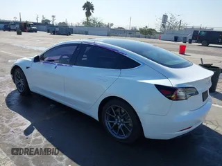 2020 Tesla Model 3 Standard Range Plus with VIN 5YJ3E1EA4LF805205, listed as a IAAI auction lot 41850744 with Not Provided miles. Bid and sale history available at carsss.com. Image 3.