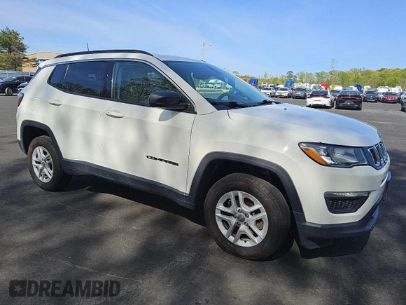 2019 Jeep Compass Sport with VIN 3C4NJDAB8KT752755, listed as a Copart auction lot 55169765 with 77,176 mi miles and Clean title. Bid and sale history available at DreamBid. Image 4.