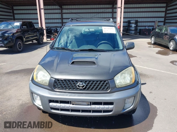 2003 Toyota RAV4 with VIN JTEGH20V130096493, listed as a IAAI auction lot 41743294 with 219,031 mi miles. Bid and sale history available at carsss.com. Image 12.
