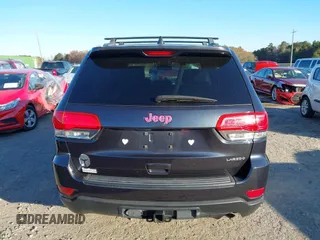 2014 Jeep Grand Cherokee Laredo with VIN 1C4RJEAG3EC218128, listed as a IAAI auction lot 40951611 with 119,596 mi miles and . Bid and sale history available at DreamBid. Image 16.