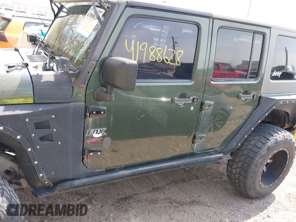 2007 Jeep Wrangler Unlimited X with VIN 1J4GA39147L101084, listed as a IAAI auction lot 41988628 with 194,562 mi miles and . Bid and sale history available at DreamBid. Image 14.