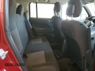 2014 Jeep Patriot Latitude with VIN 1C4NJRFB3ED792919, listed as a Copart auction lot 66043945 with 142,224 mi miles and Salvage title. Bid and sale history available at DreamBid. Image 11.