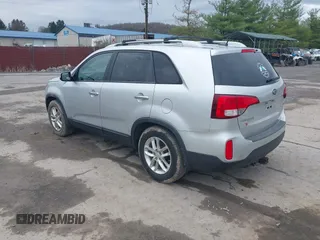 2014 Kia Sorento LX with VIN 5XYKTCA63EG506489, listed as a IAAI auction lot 41965074 with 143,875 mi miles and . Bid and sale history available at carsss.com. Image 3.