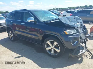 2015 Jeep Grand Cherokee High Altitude with VIN 1C4RJFCG5FC807394, listed as a IAAI auction lot 42452034 with 72,011 mi miles and . Bid and sale history available at DreamBid. Image 1.