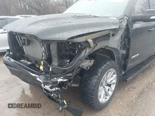 2021 Ram 1500 Laramie with VIN 1C6SRFJT6MN580803, listed as a IAAI auction lot 41207914 with 56,891 mi miles and . Bid and sale history available at DreamBid. Image 18.